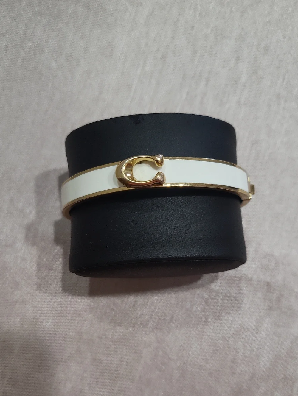 Coach White Enamel Bangle Bracelet with Gold 'C' Accent